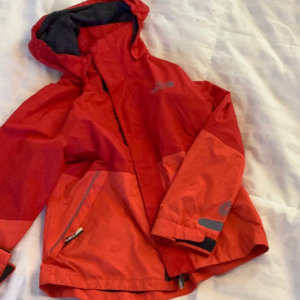 Icelandic light weight all weather jacket with reflectors.